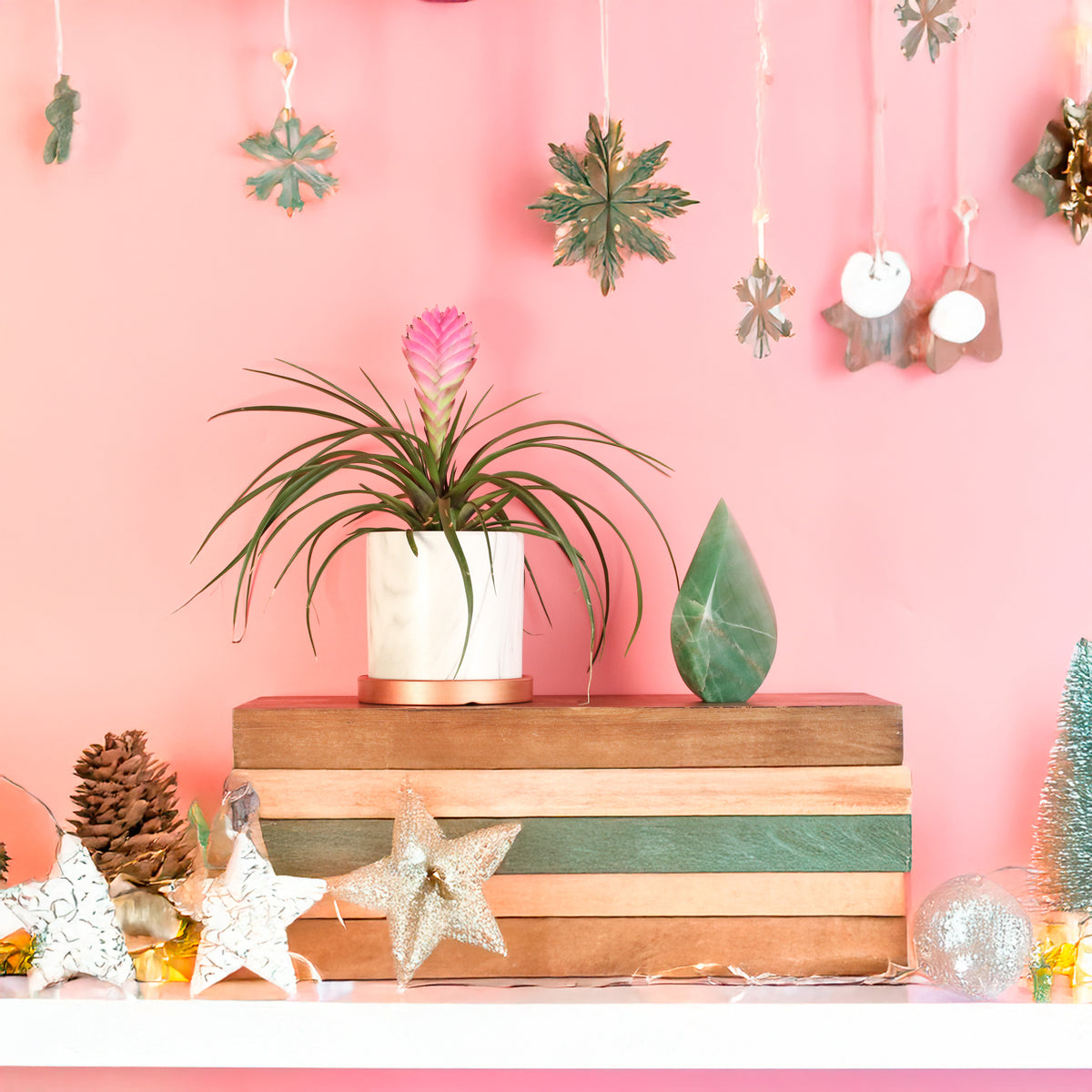 Green Aventurine Flame next to holiday decor